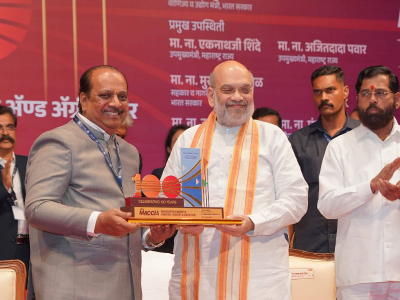 Shri. Lalit Gandhi, Shri. Amit Shah and Shri. Eknath Shinde with the MACCIA Centenary Logo